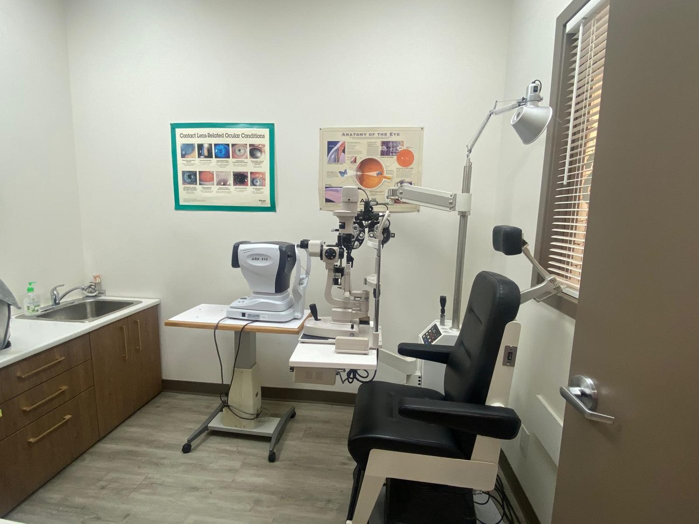 Eye exam room with optometry equipment